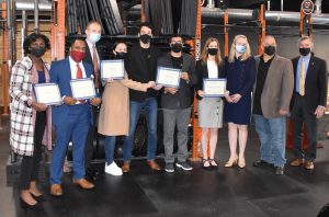 Winners of the EDGE Grants competition are pictured with Governor John Carney at an announcement event in December 2021.